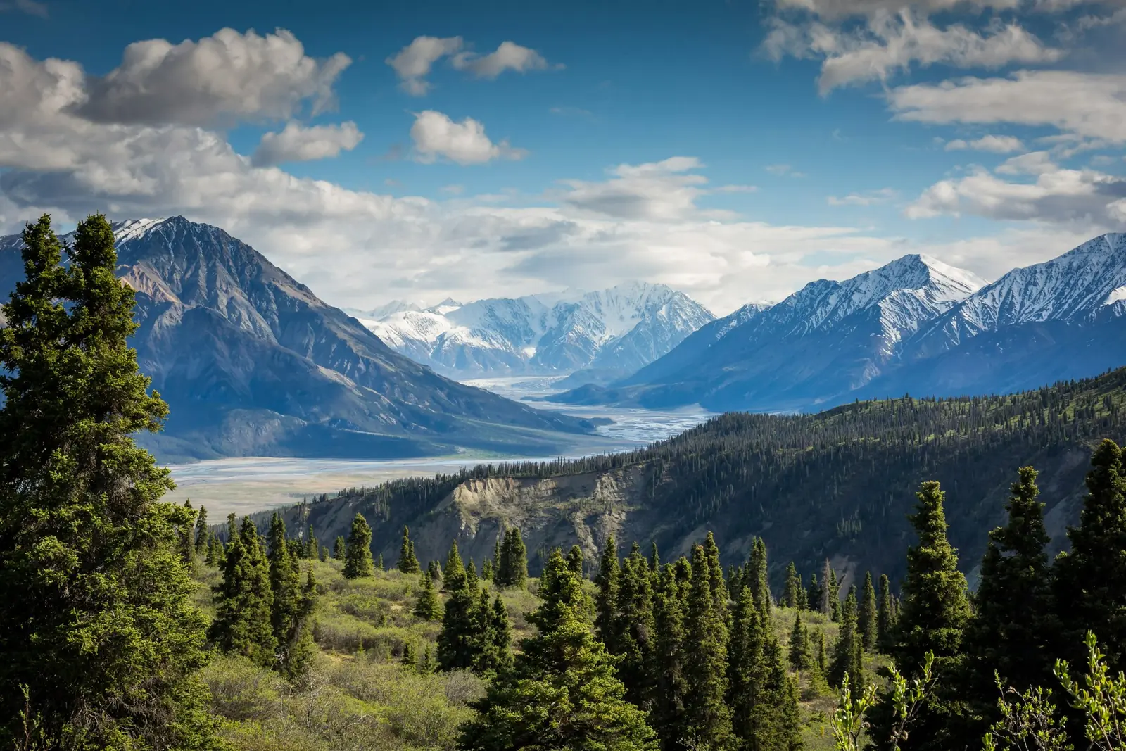 A sharp mountain ridge above a shadowed valley
